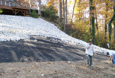 Erosion control rip rap stone installation