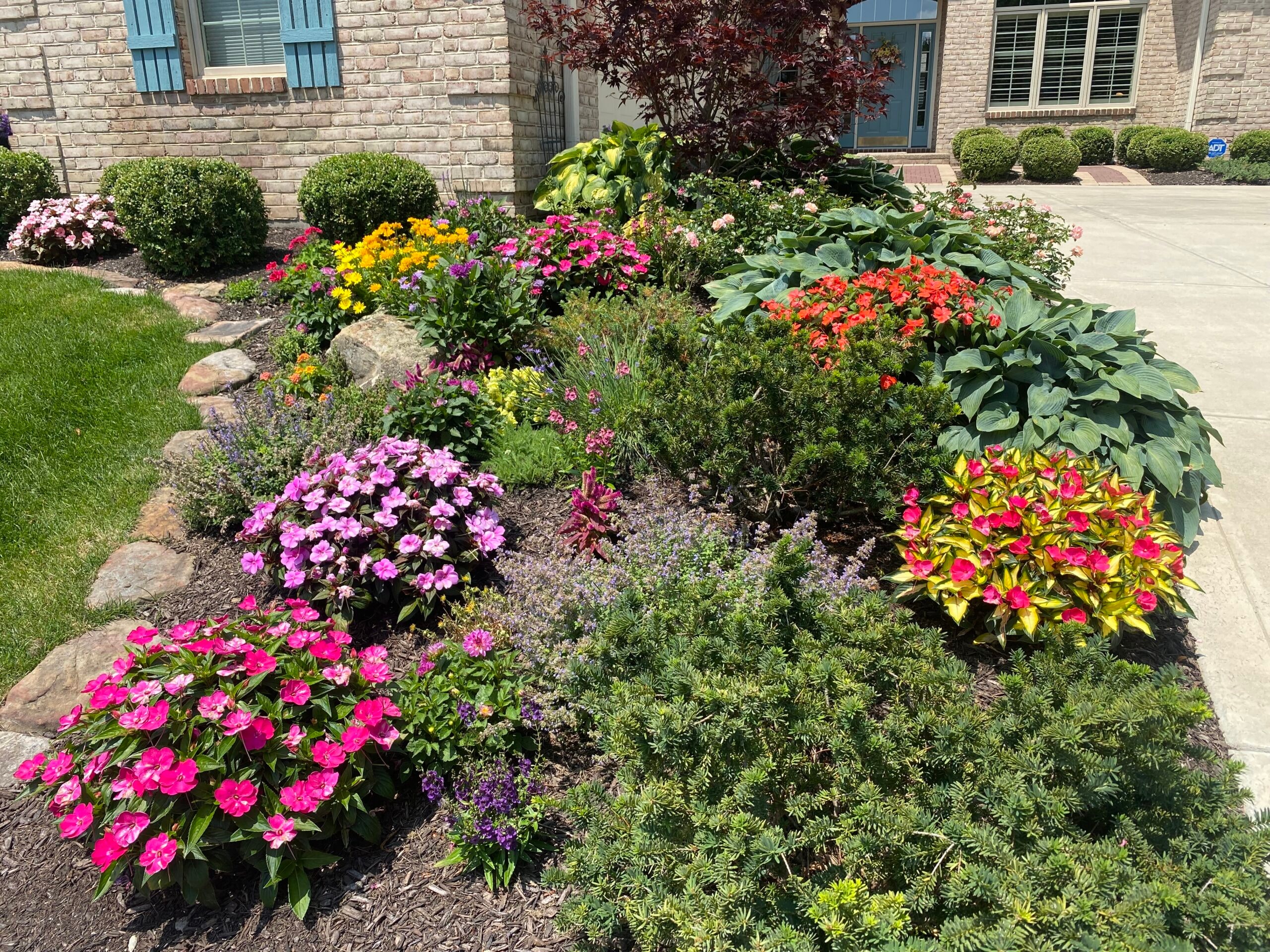 Berger Hargis landscaping crew working on a property