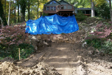 Erosion control rip rap stone retaining wall hillside